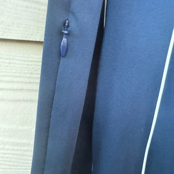 Tuckernuck Sport Roxana Half Zip Golf Dress in navy with white piping - Picture 6 of 11